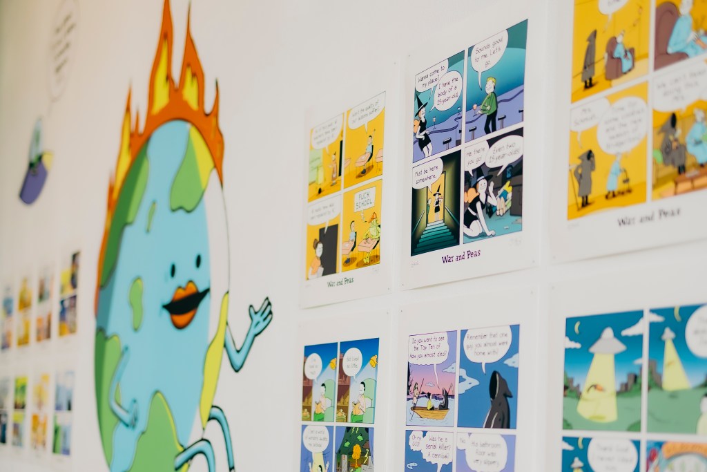 Close up of webcomic comic strips exhibition by War and Peas. Photo: Tina Stariha / Kino Šiška